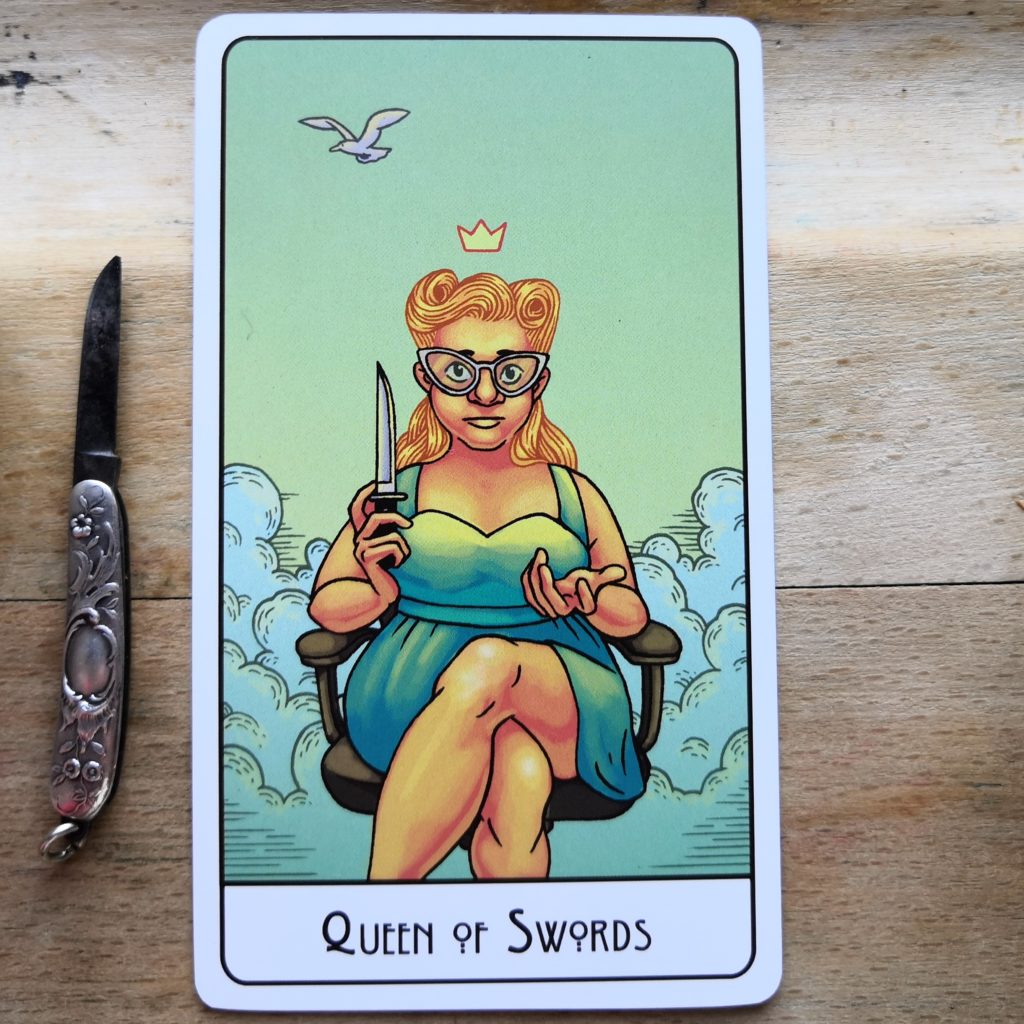 queen of swords of this might hurt tarot, a tiny victorian knife